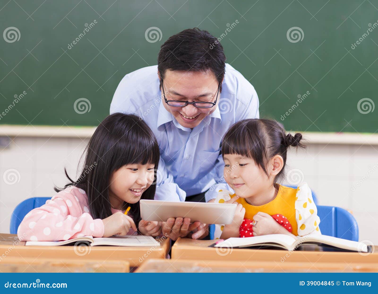 teacher and children with digital tablet or ipad