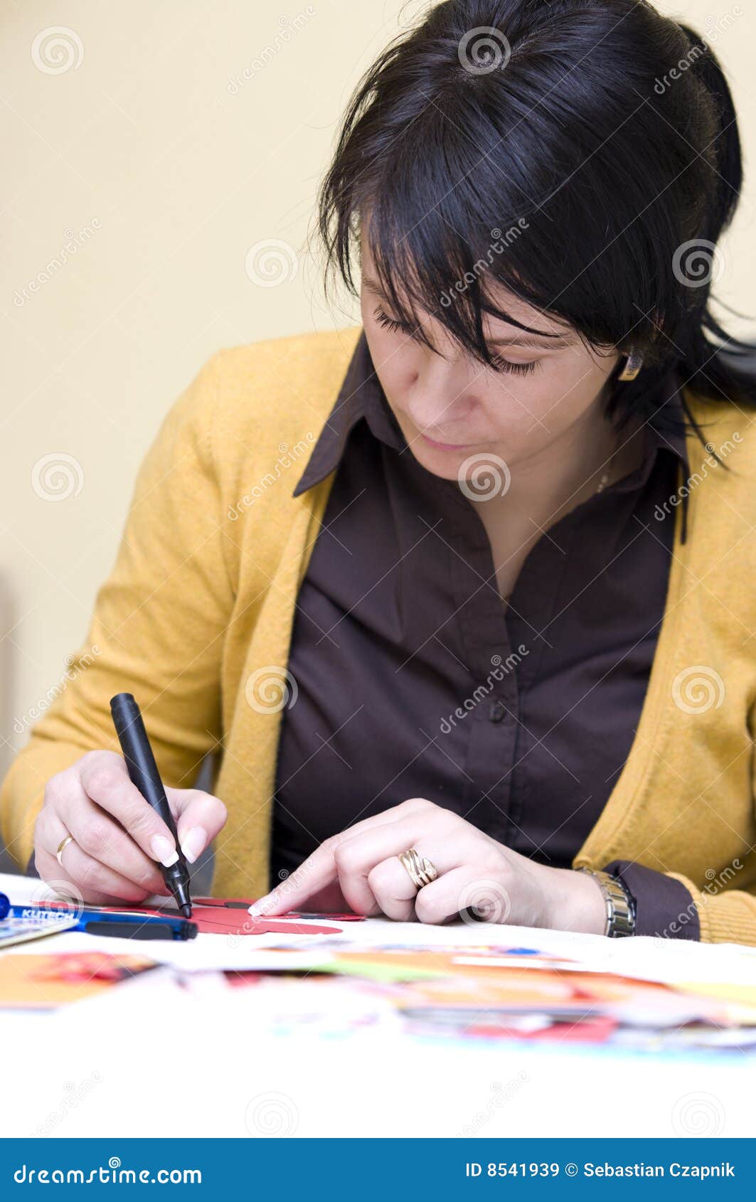 Teacher doing cutouts stock image. Image of education - 8541939