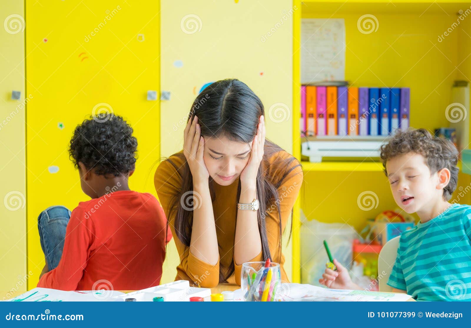 Teacher Get Headache with Two Naughty Kids in Classroom at Kindergarten