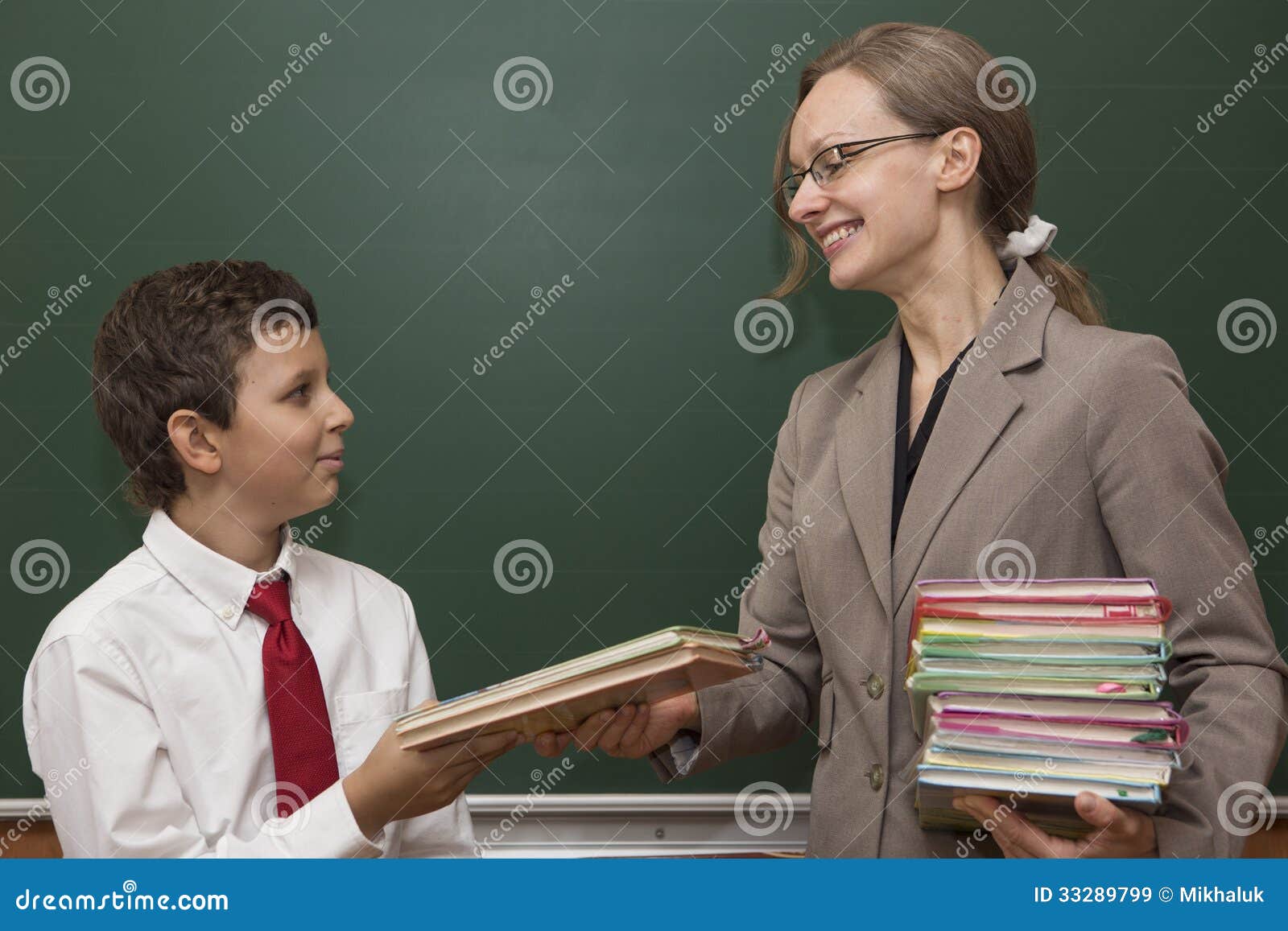 Teacher Hands Over A Book To Student Royalty Free Stock Images Image