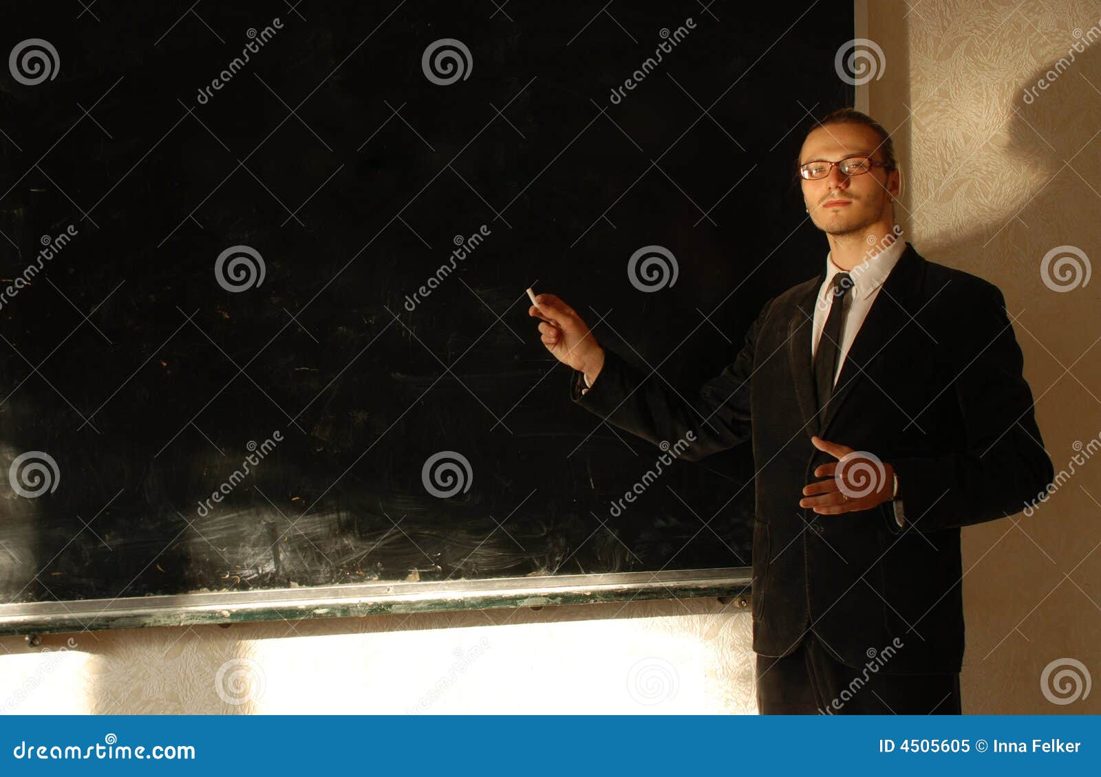 Teacher near blackboard stock image. Image of drawing 4505605