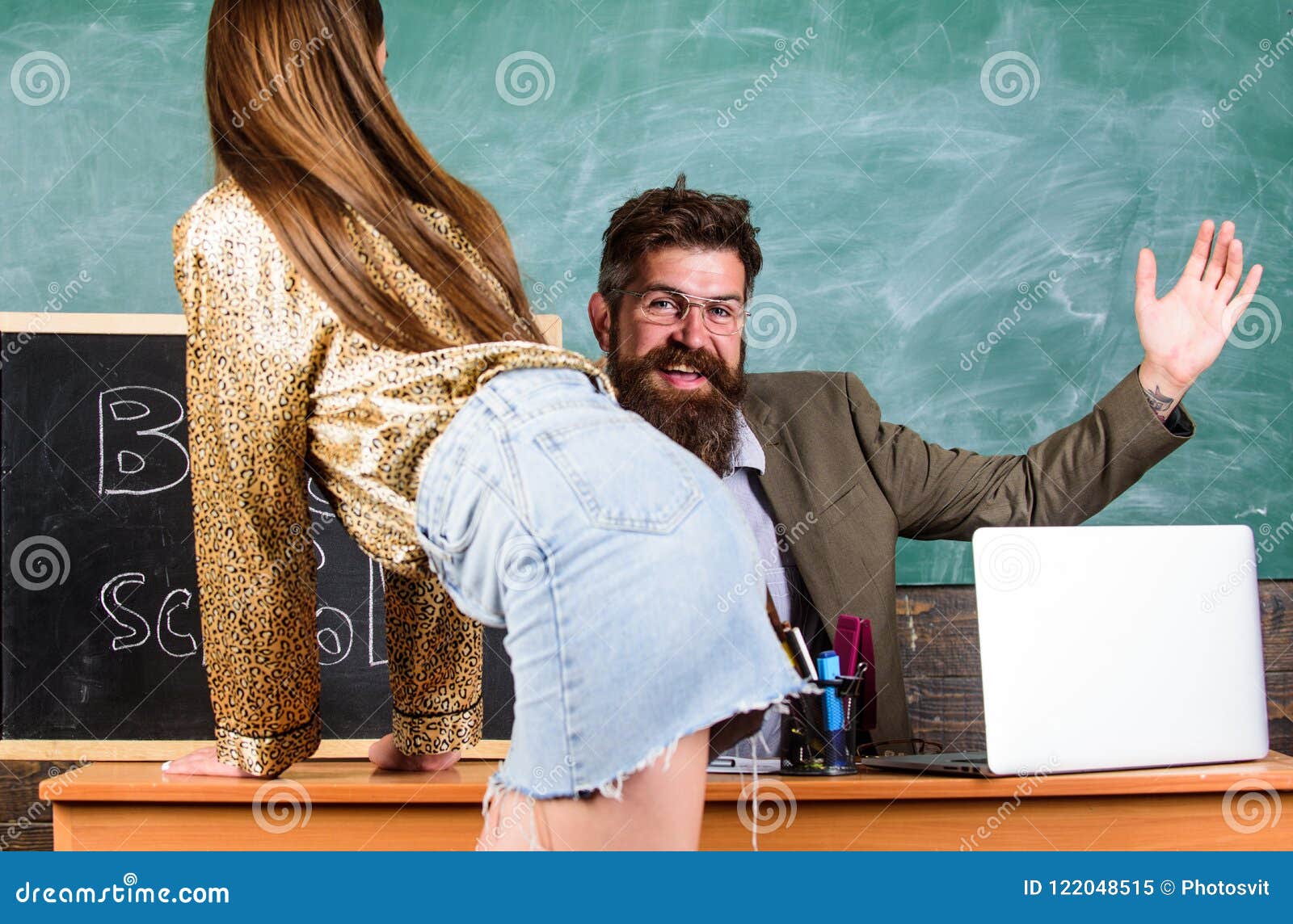 Young girl being physically punished by teacher with a ruler Stock Photo - Alamy
