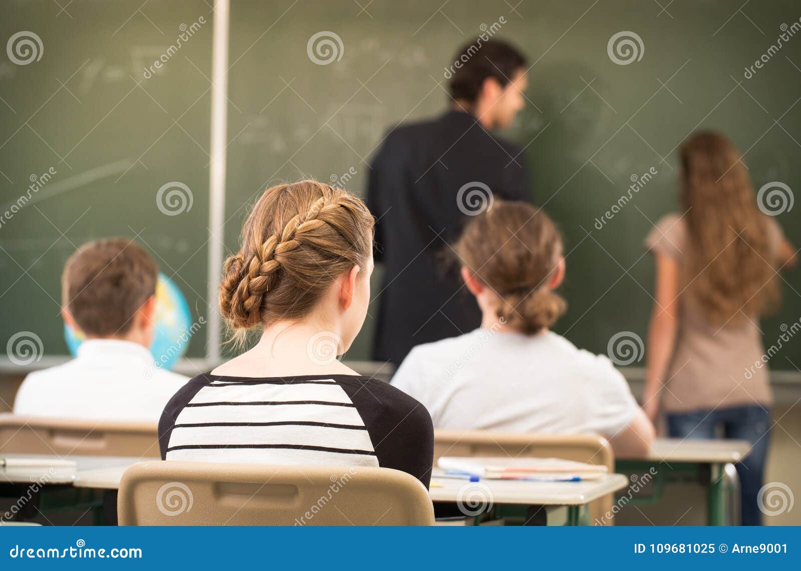 rteacher teaching or educate at the board a class in schoolr