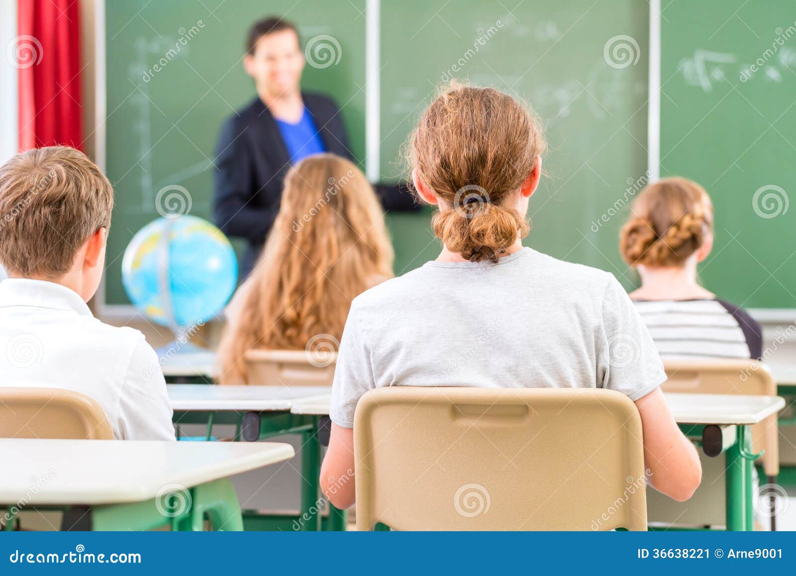 teacher teaching or educate at the board a class in school