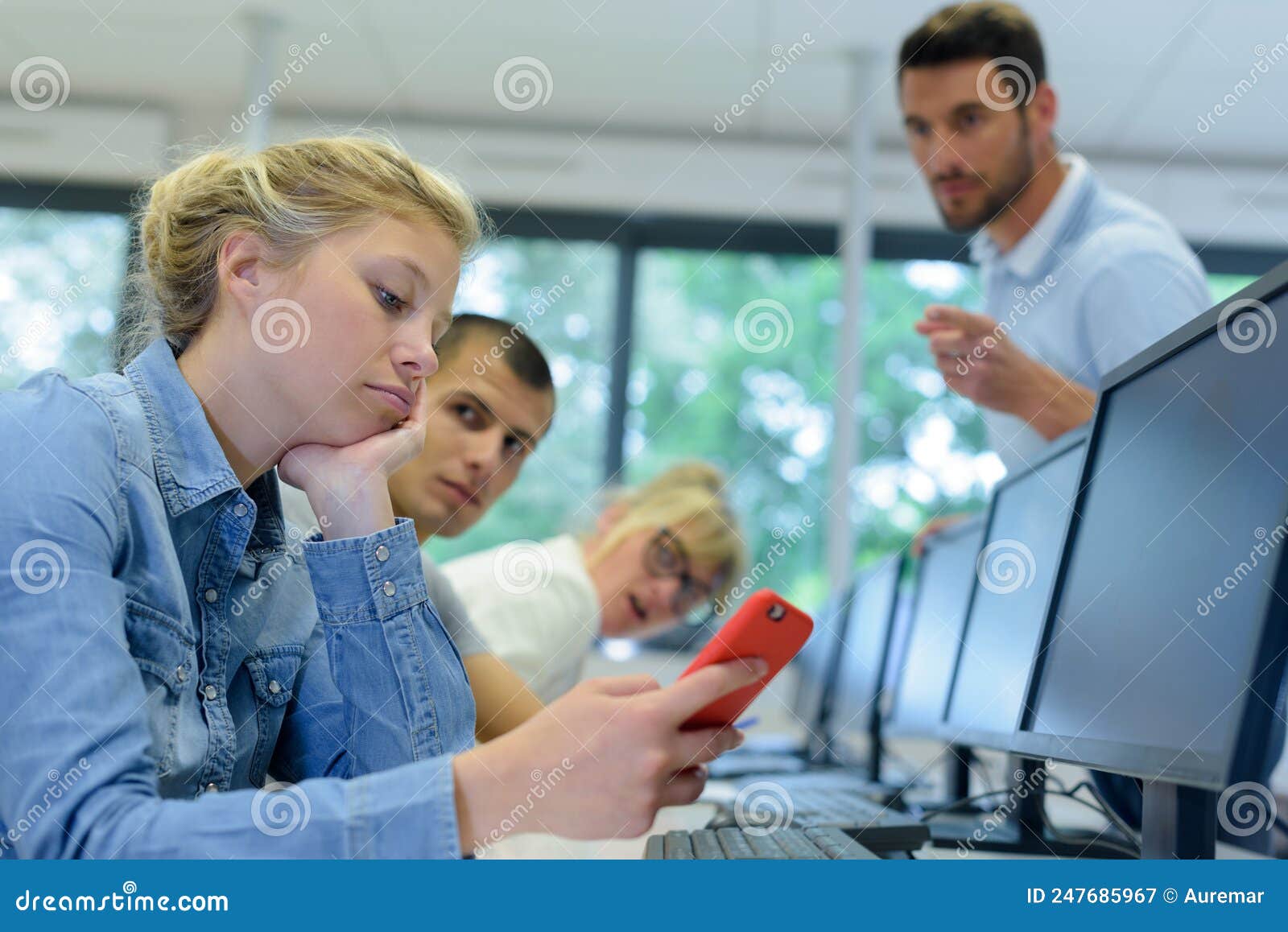 Teacher Telling Off Student Chatting with Smartphone in Classroom Stock Image Image of