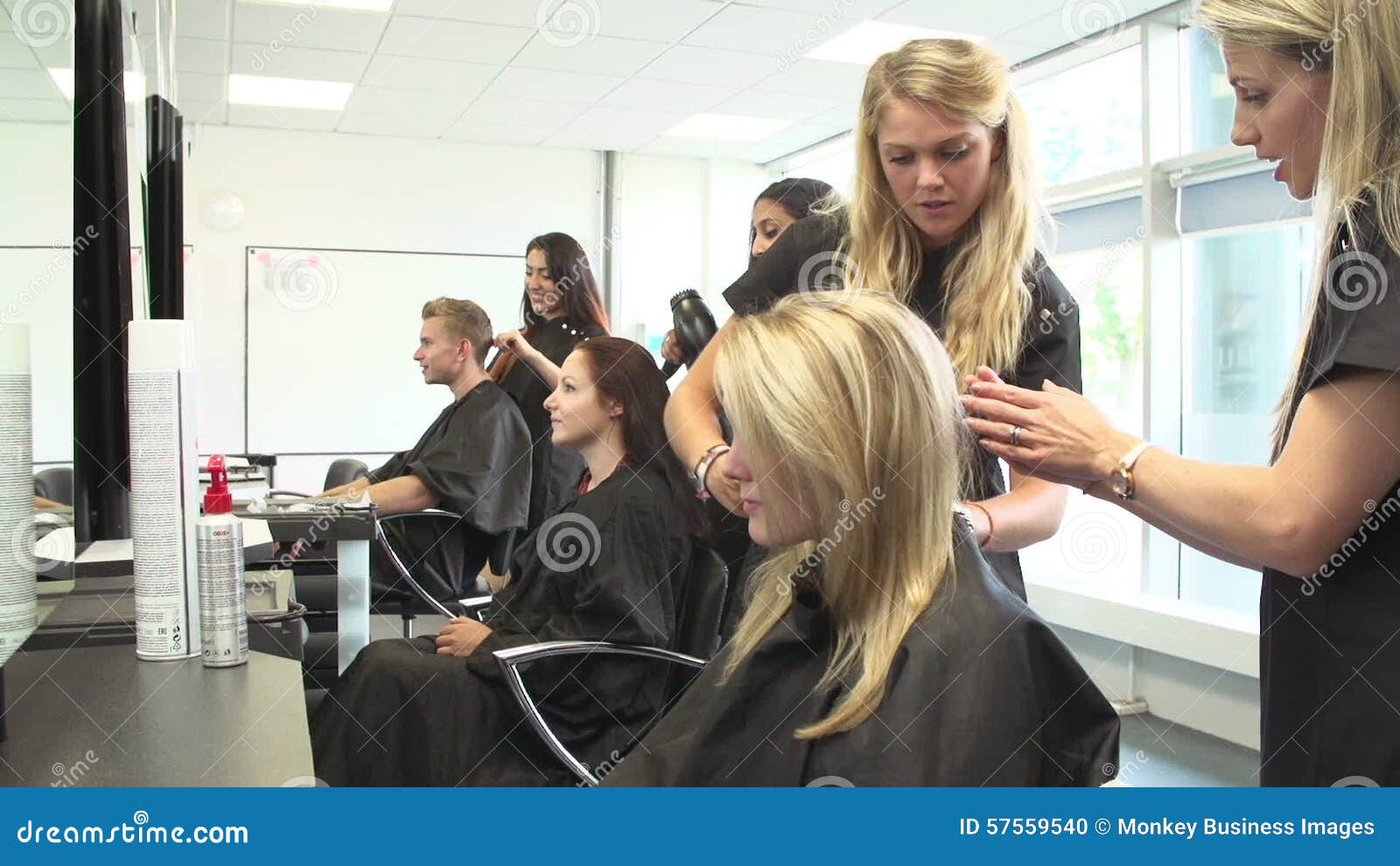 Teacher Training College Students In Hairdressing Class Stock