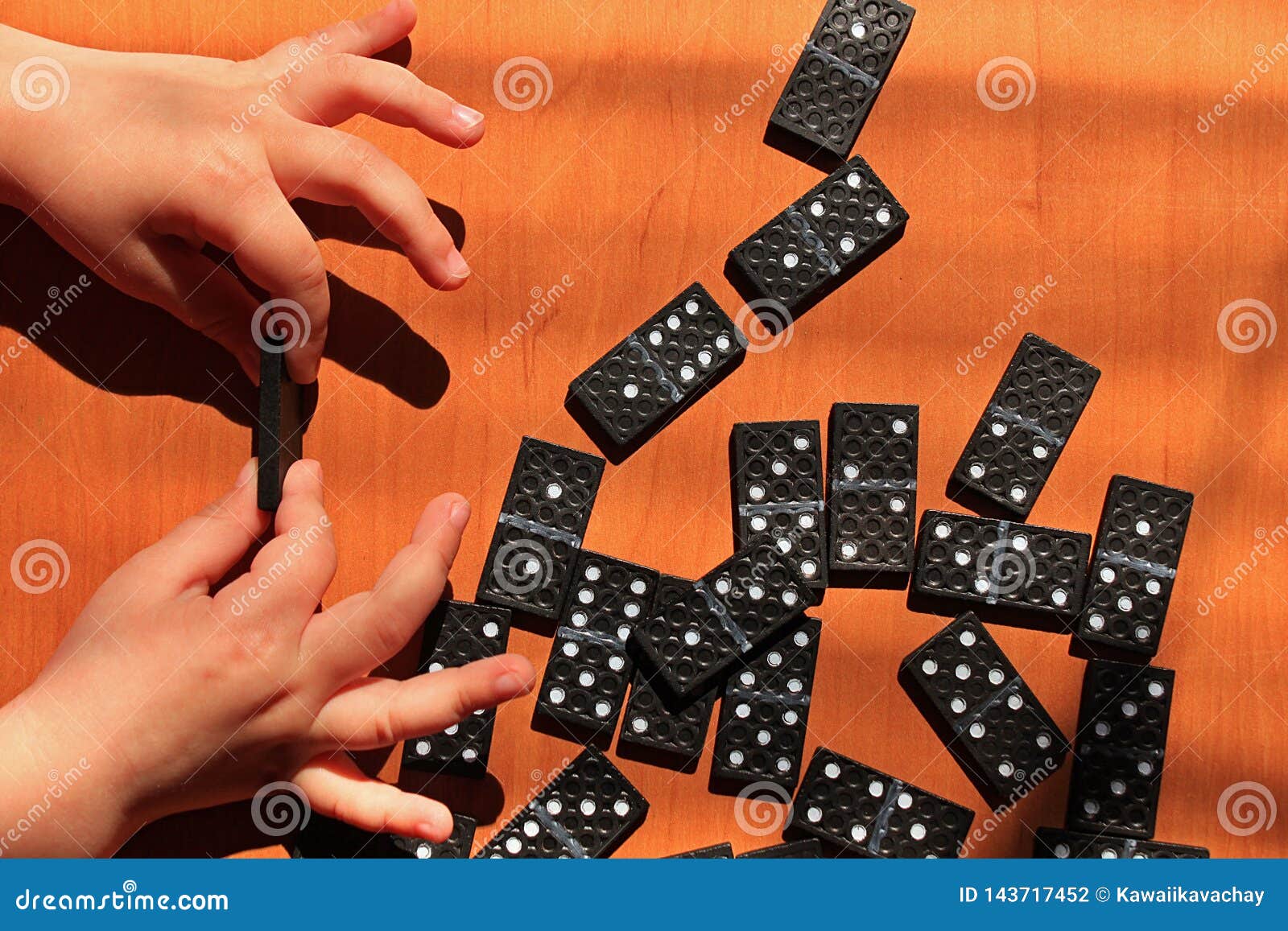 Teaching Children To Play Dominoes Game On A Wooden Background Stock Photo Image Of Business Management Teaching Children To Play Dominoes Game On A Wooden Background Stock Photo Image Of Business Management