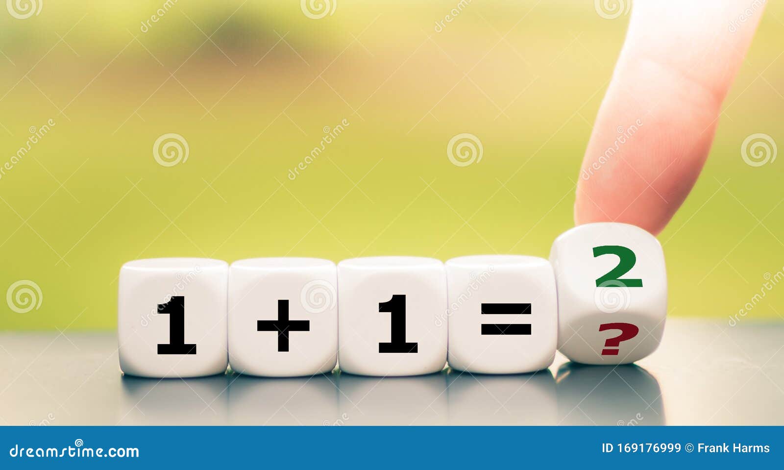 teaching mathematics. hand turns a dice and solves and equation