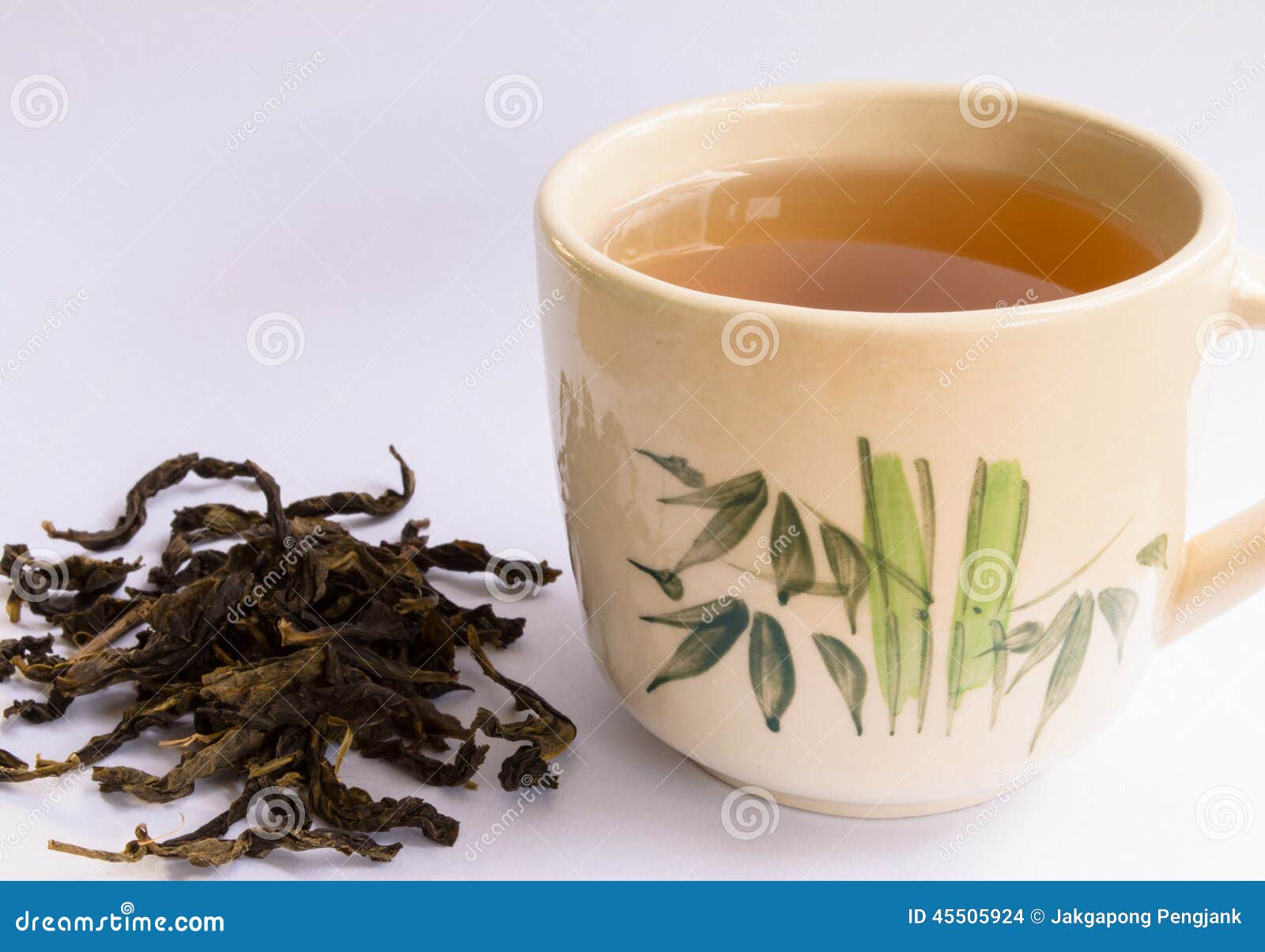 Teacup with tea leaf stock photo. Image of elegance, herb 45505924