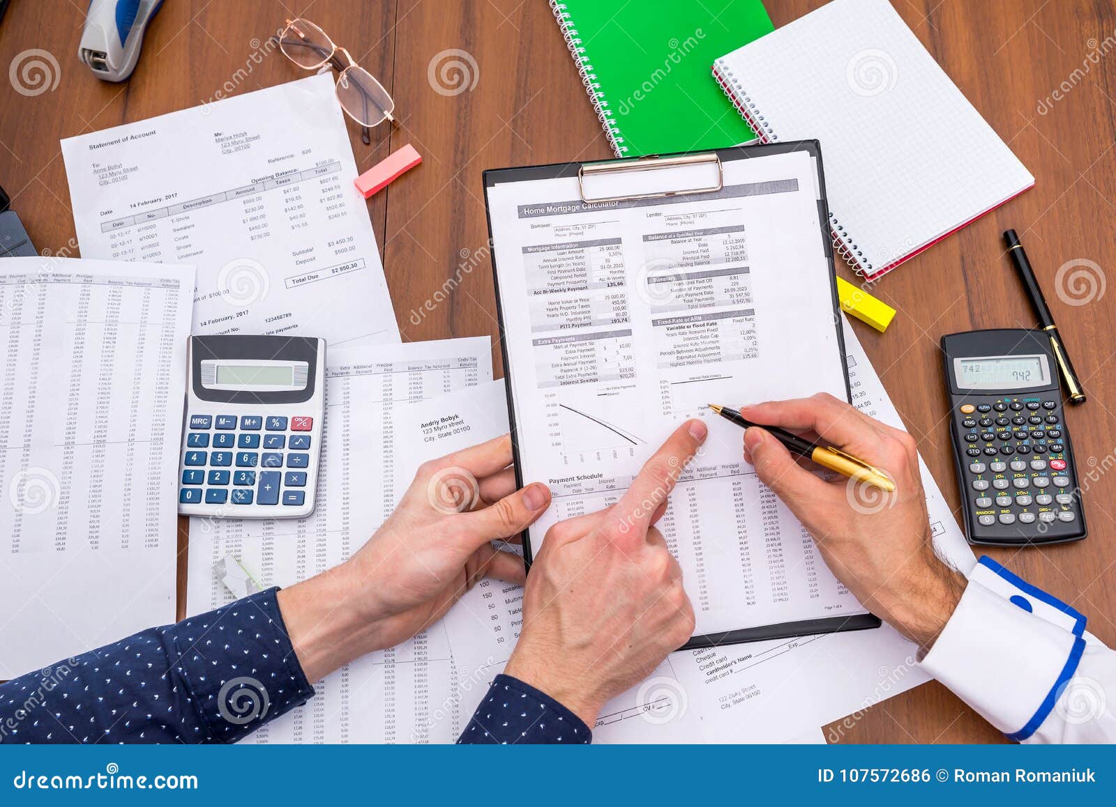 team analyzes the business expenses of the annual budget.