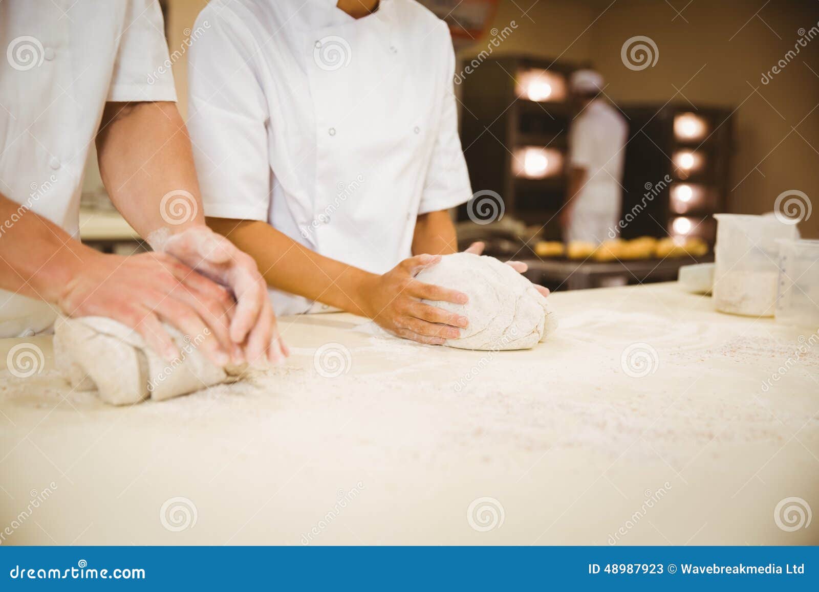 Team of Bakers Kneading Dough Stock Image Image of whites, catering