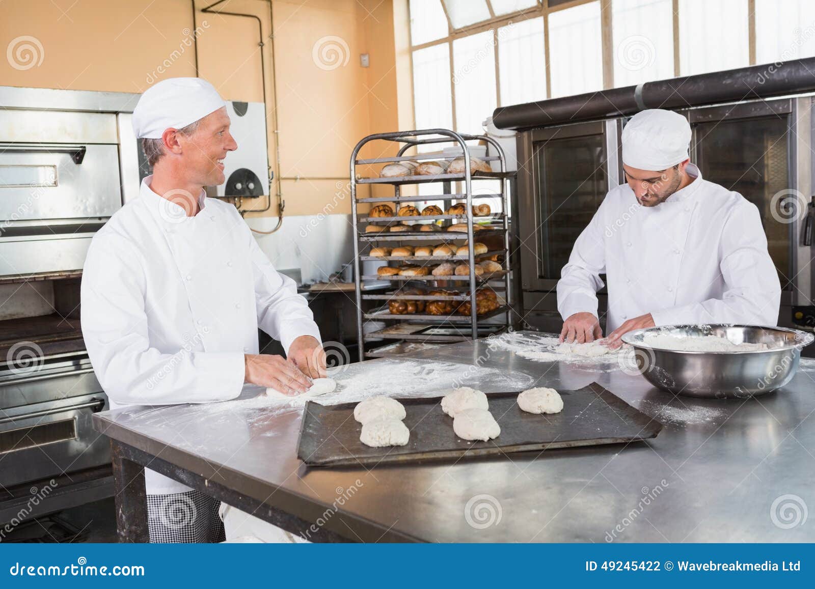 Team of Bakers Preparing Dough Stock Photo Image of happy, commercial