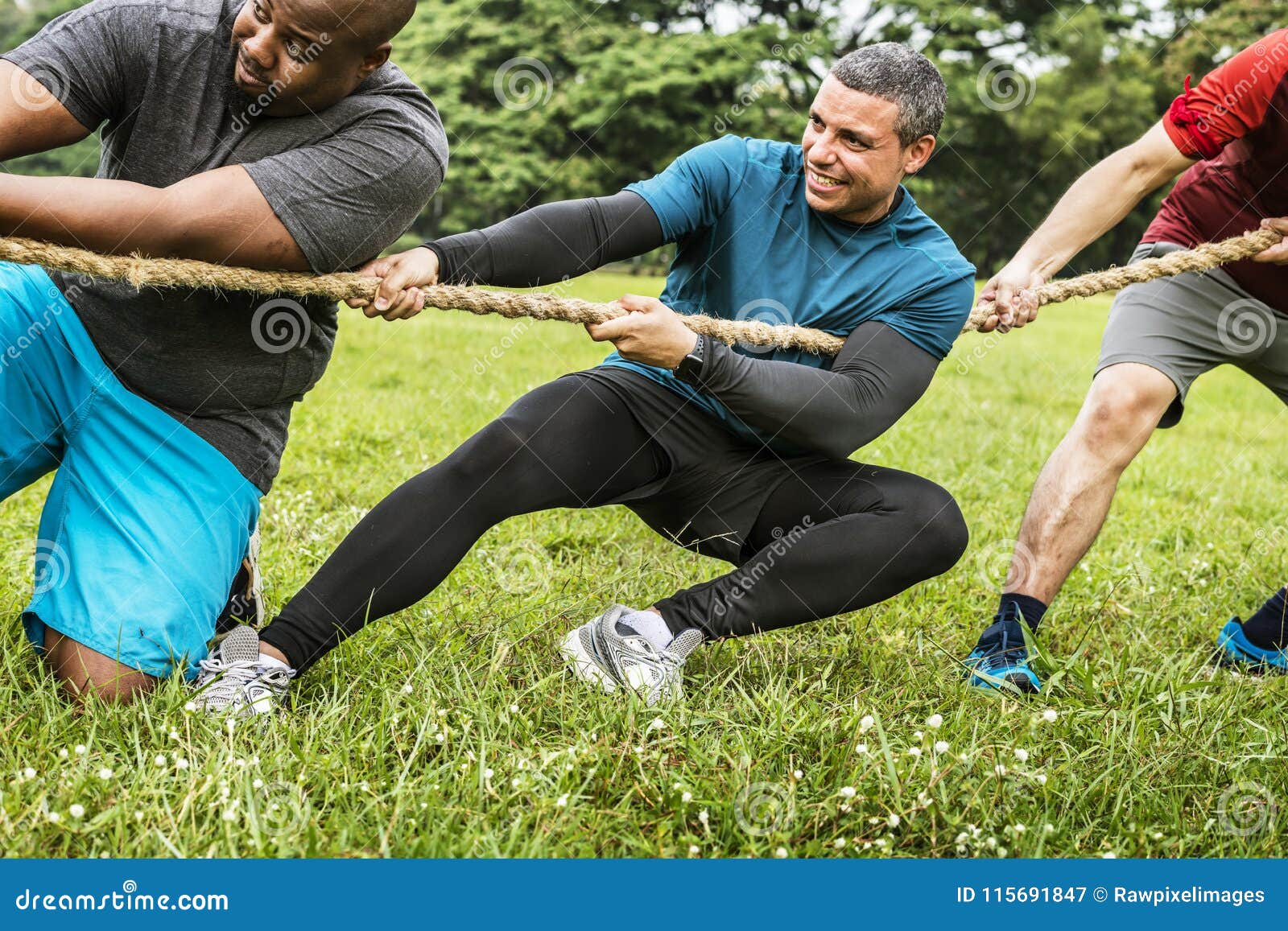 team competing in tug of war