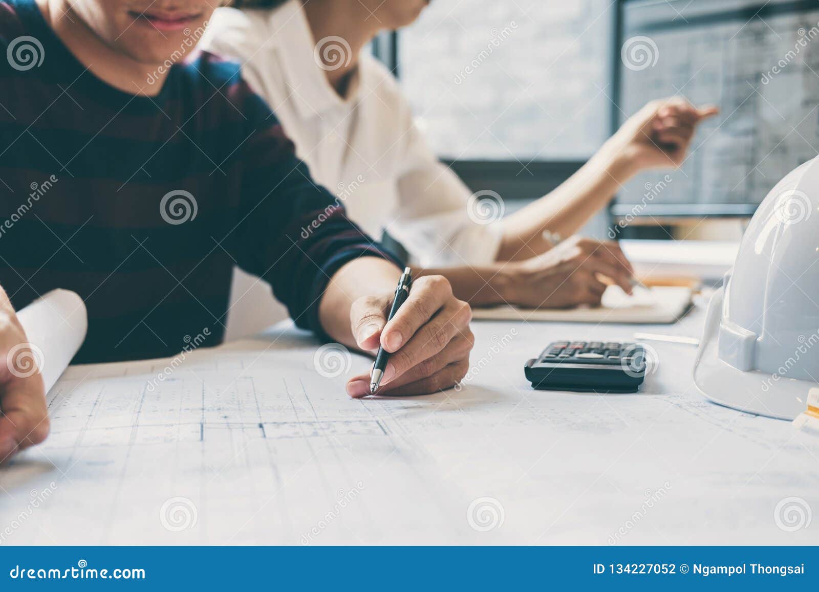 Team of Construction Engineering or Architect Hands Working on