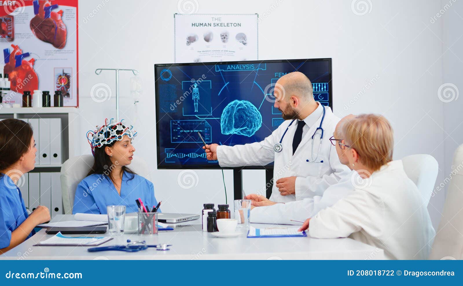team of doctors analysing brain functions using high tech