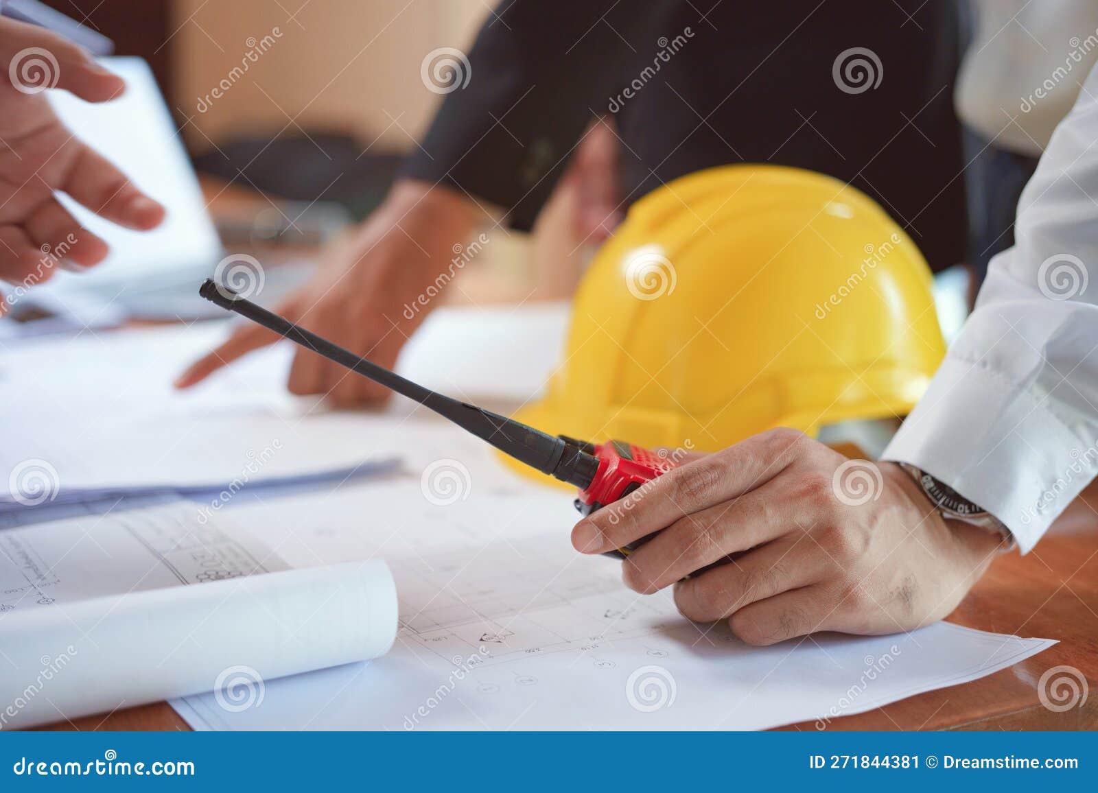 Team of Engineer or Technician Holding Walkie Talkie and Planning about