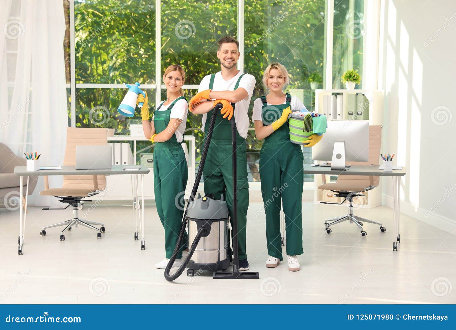 Team of Janitors with Cleaning Supplies Stock Photo Image of