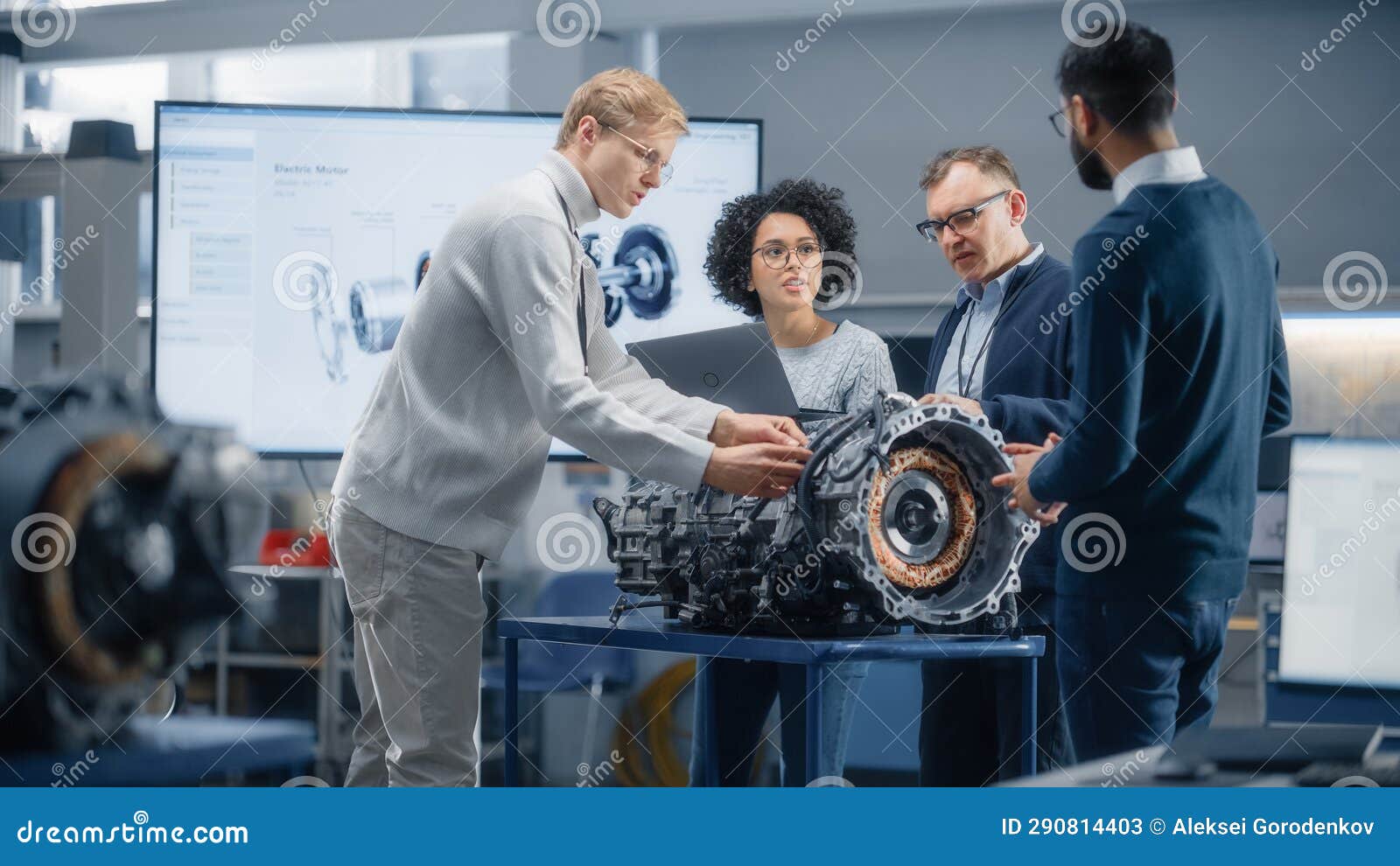 Team Meeting of Engineers Working on Innovative Electric Motor. Group