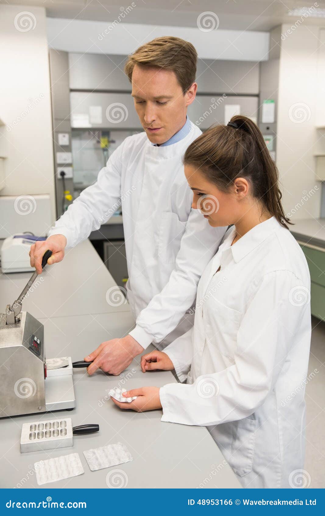 Team Pharmacists Using Press To Make Pills Stock Photos Free & RoyaltyFree Stock Photos from