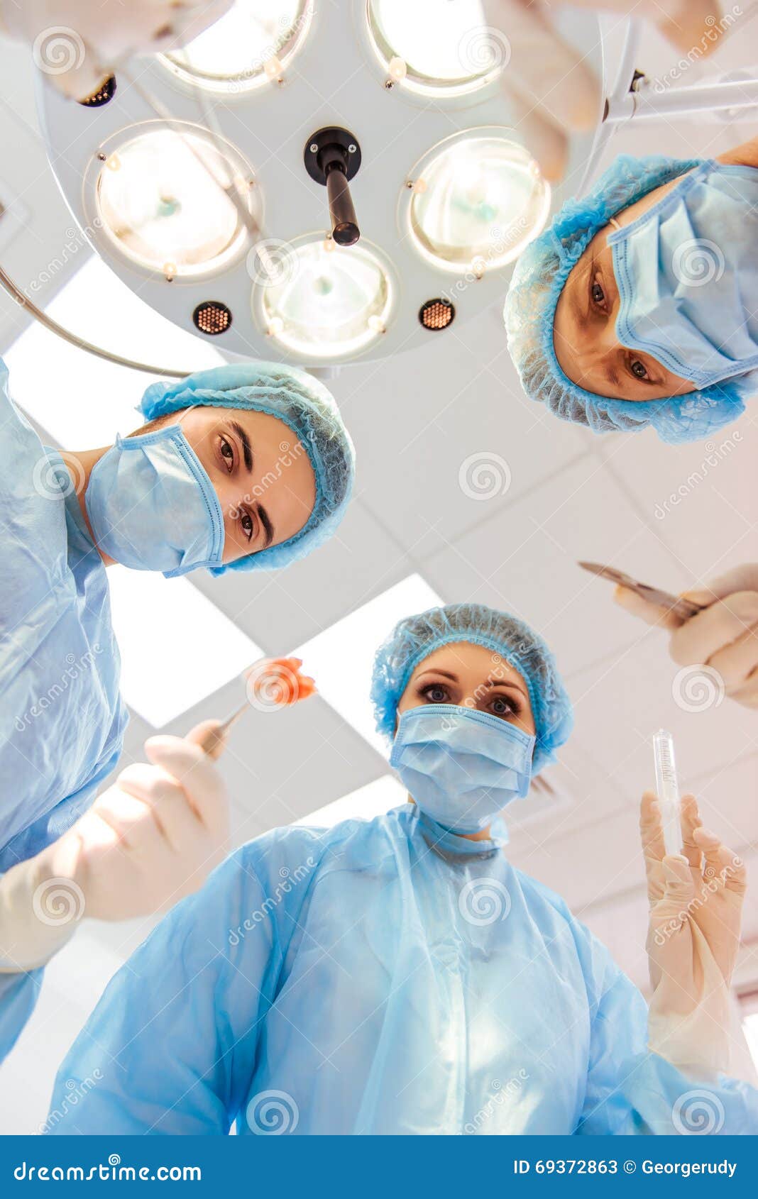 Team surgeons at work stock image. Image of clinic, professional 69372863