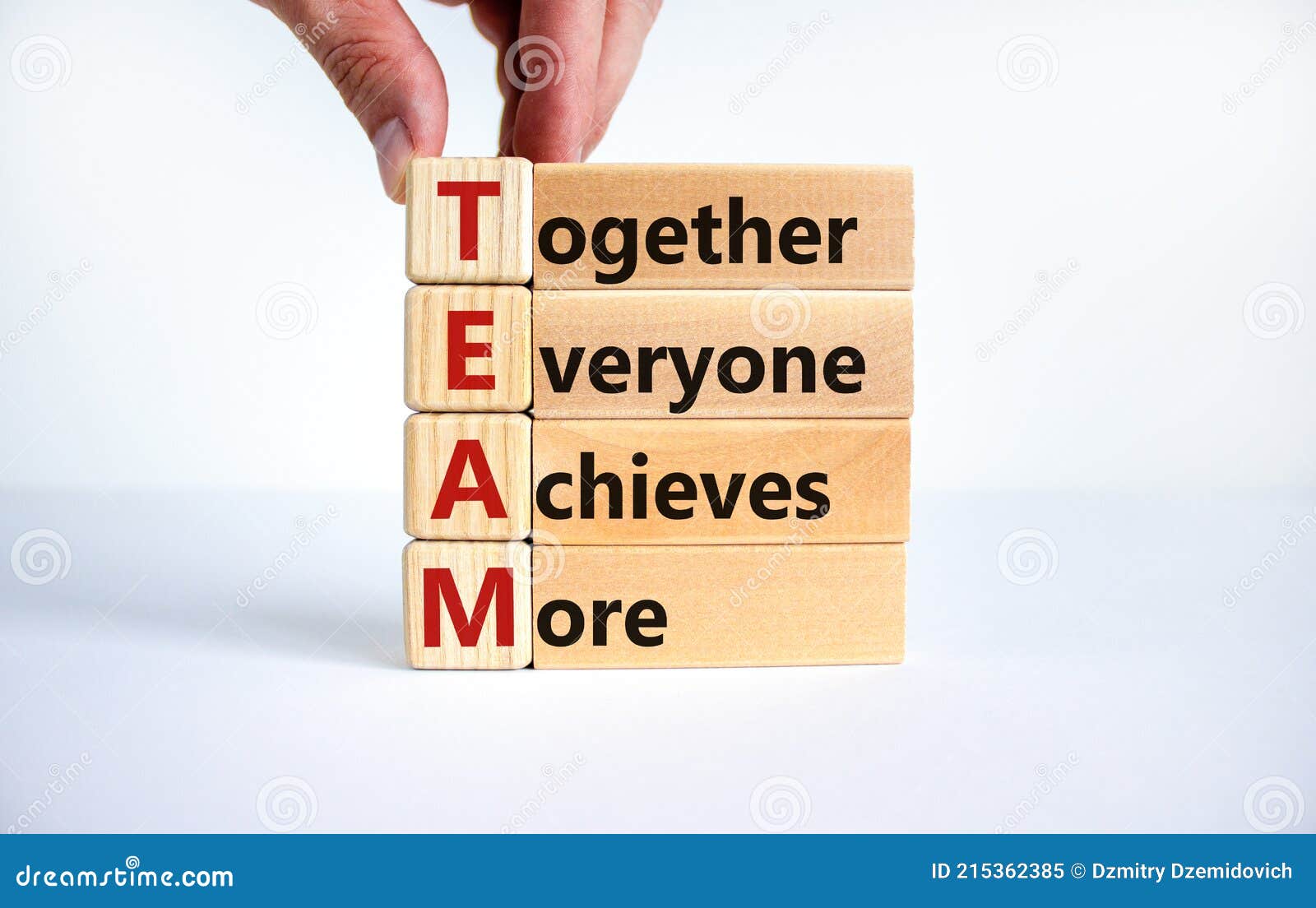 TEAM, Together Everyone Achieves More Symbol. Wooden Cubes With Words `TEAM, Together Everyone