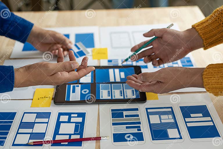 A Team of UI UX Web Designers is Working Together To Develop a Mobile ...