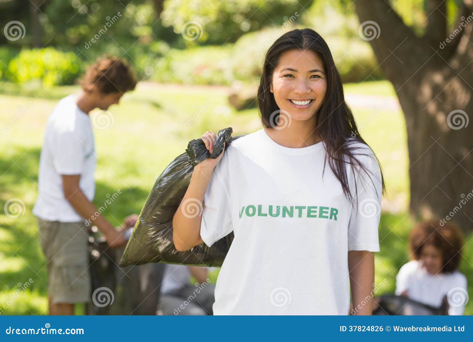 Team of Volunteers Picking Up Litter in Park Stock Photo Image of three, trash 37824826