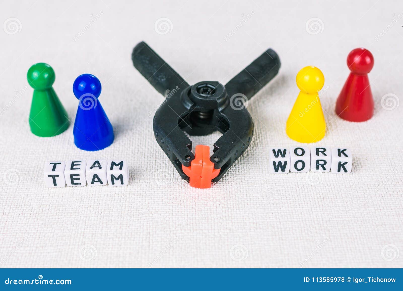 team work concept - figures form with clamp tool as  for a working labor team collaboration
