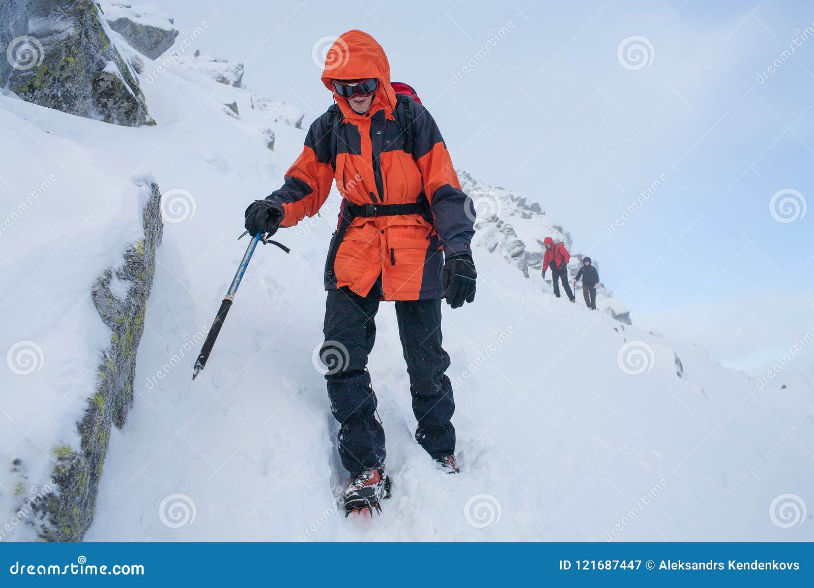 Teamwork in Alpinism. Mountaineering. Traverse of Mountain. Stock Image