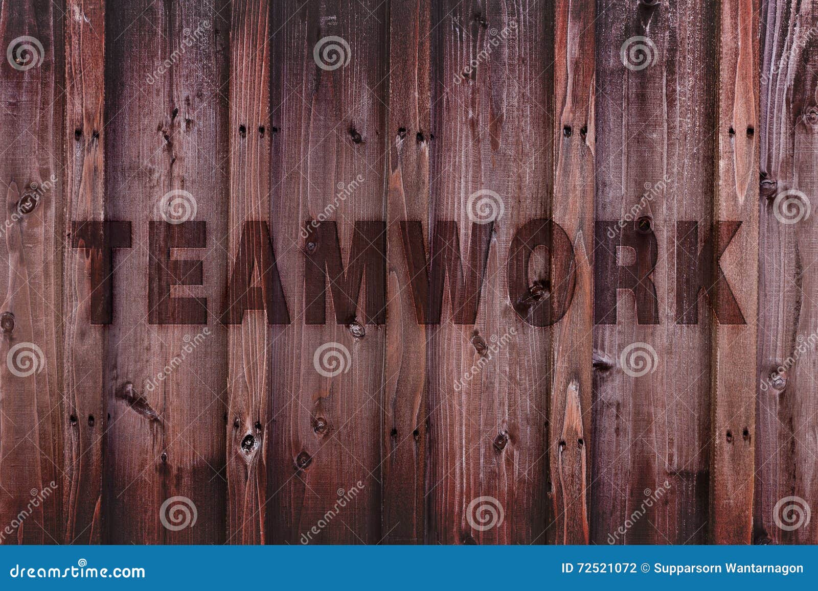 Teamwork Concept Background / Teamwork Word Engraved on Wood Stock
