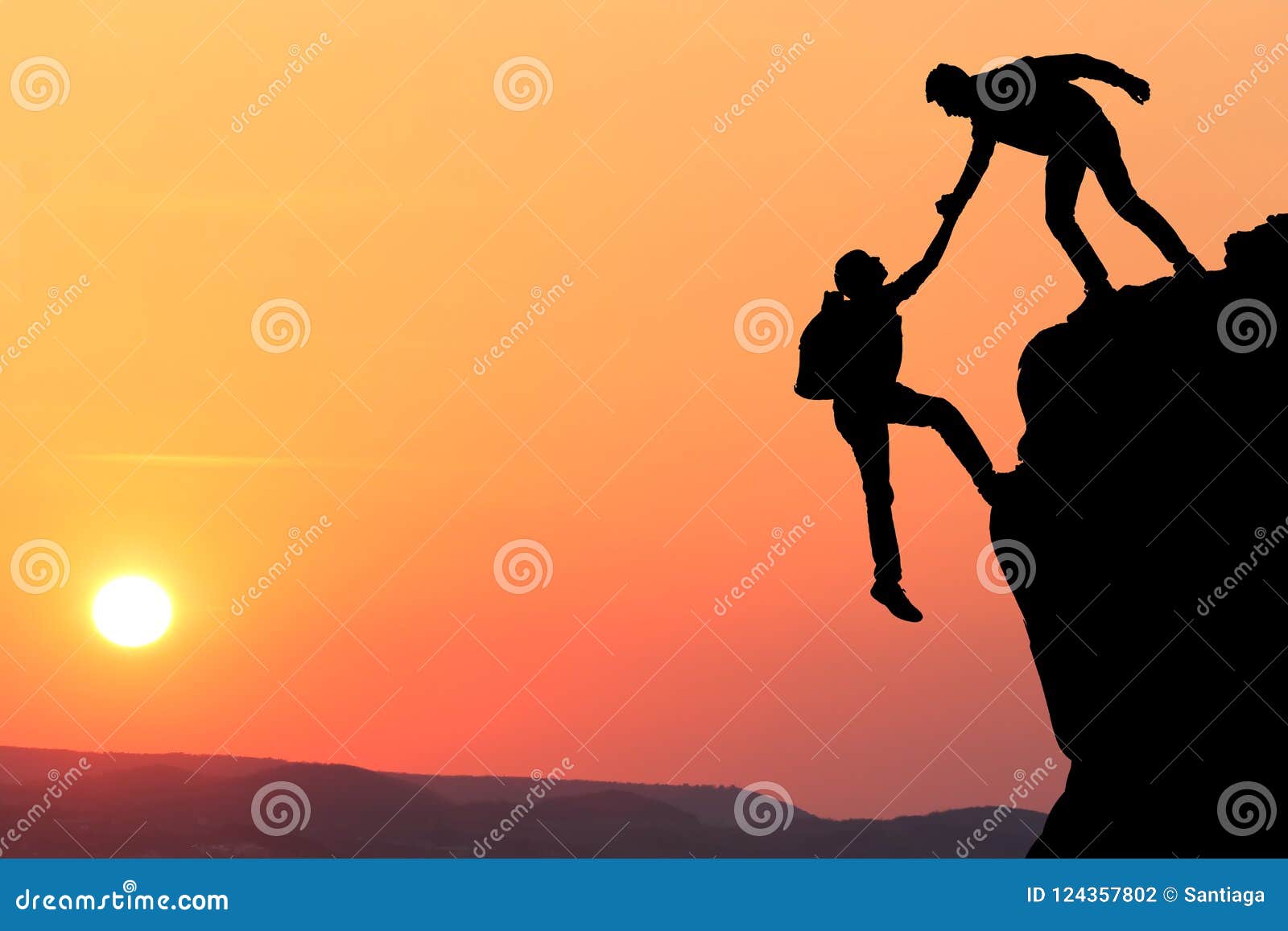 teamwork couple hiking help each other trust assistance silhouette in mountains, sunset. teamwork of two men hiker helping each ot
