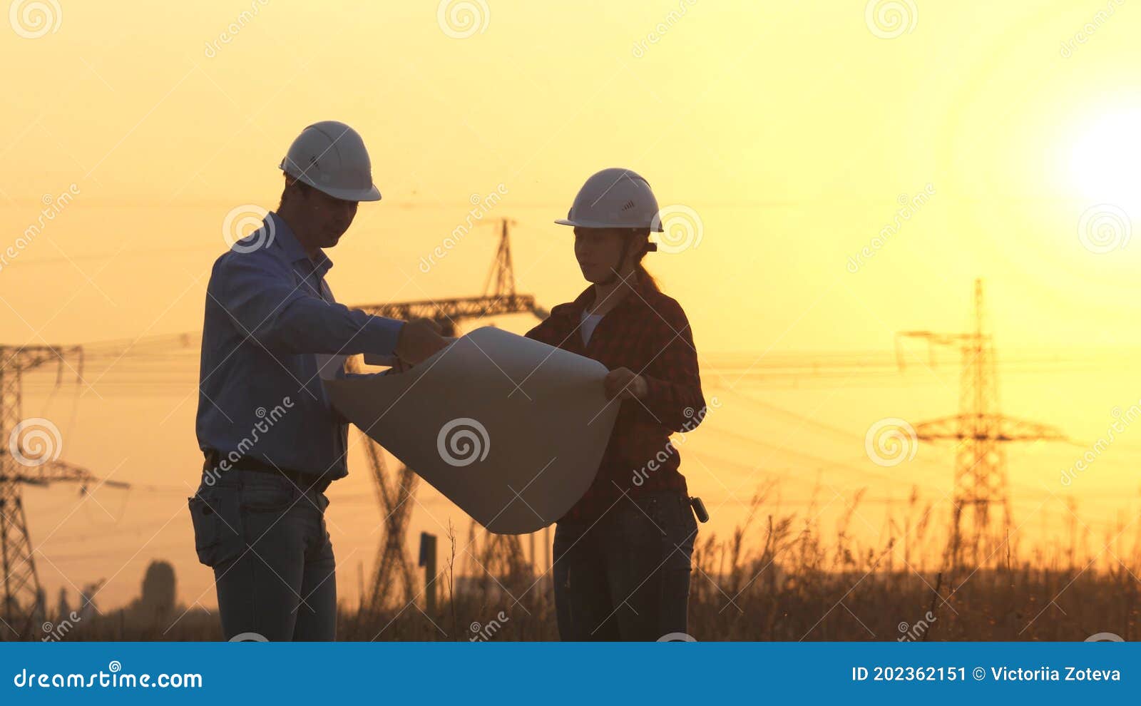 Teamwork of Power Engineers. an Engineer and Businessman are Studying