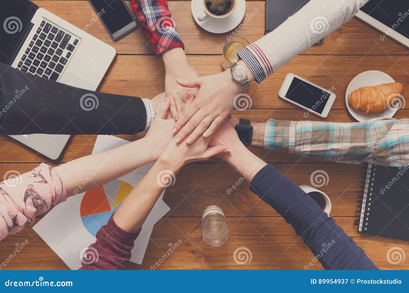 teamwork and teambuilding concept in office, people connect hands