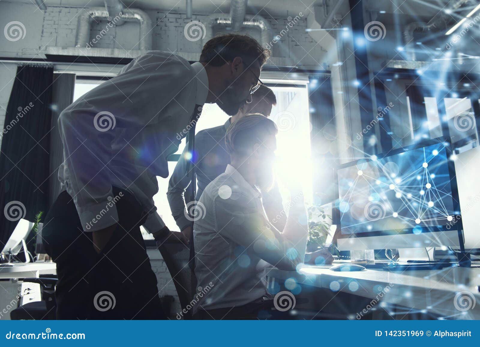 teamwork works with a computer. concept of internet sharing and interconnection. double exposure.