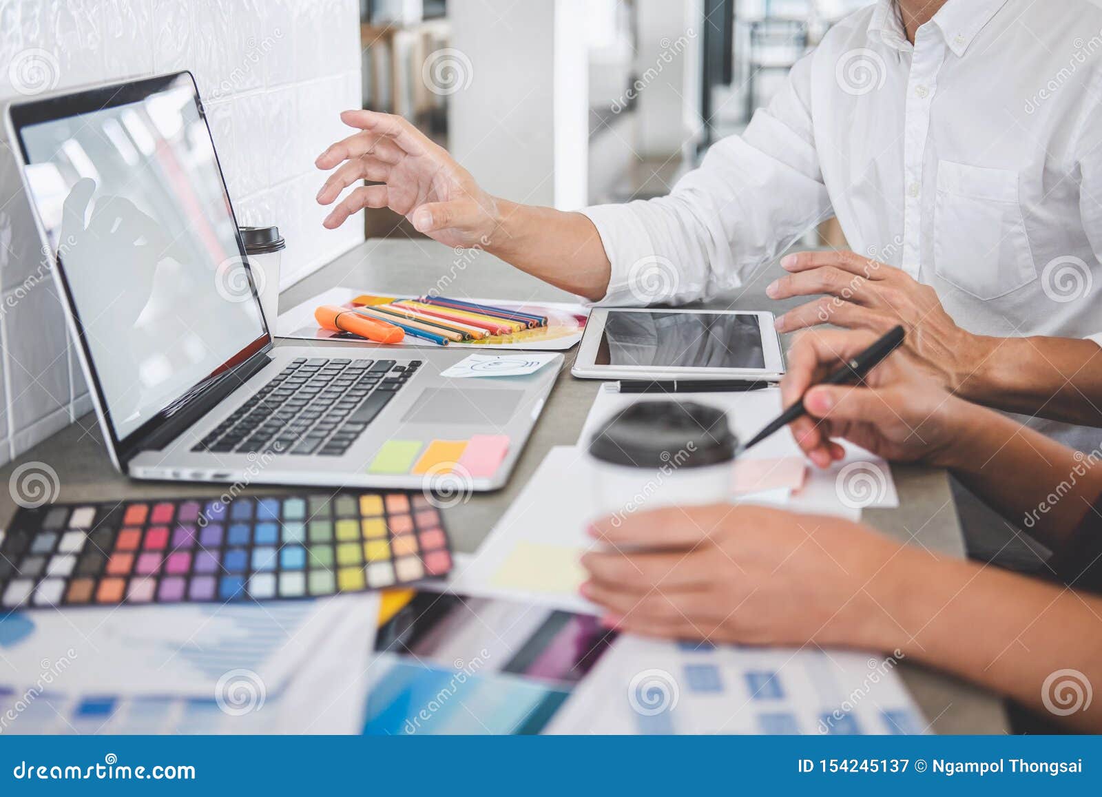 Teamwork of Young Creative Designers Working on Project Together and