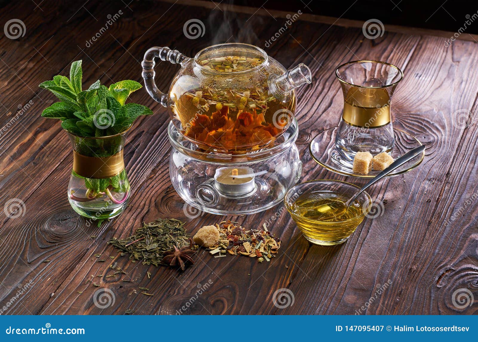 Teapot and Cup of Herbal Tea and Fresh Mint on Wooden Table Stock Image ...