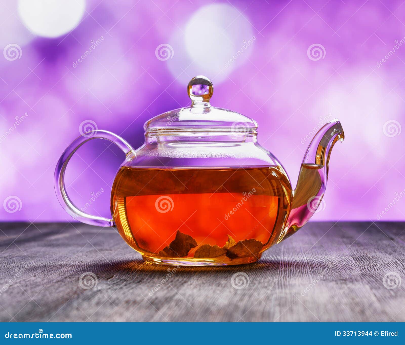 Teapot of Fresh Tea on Purple Background Stock Photo Image of flower, fresh 33713944