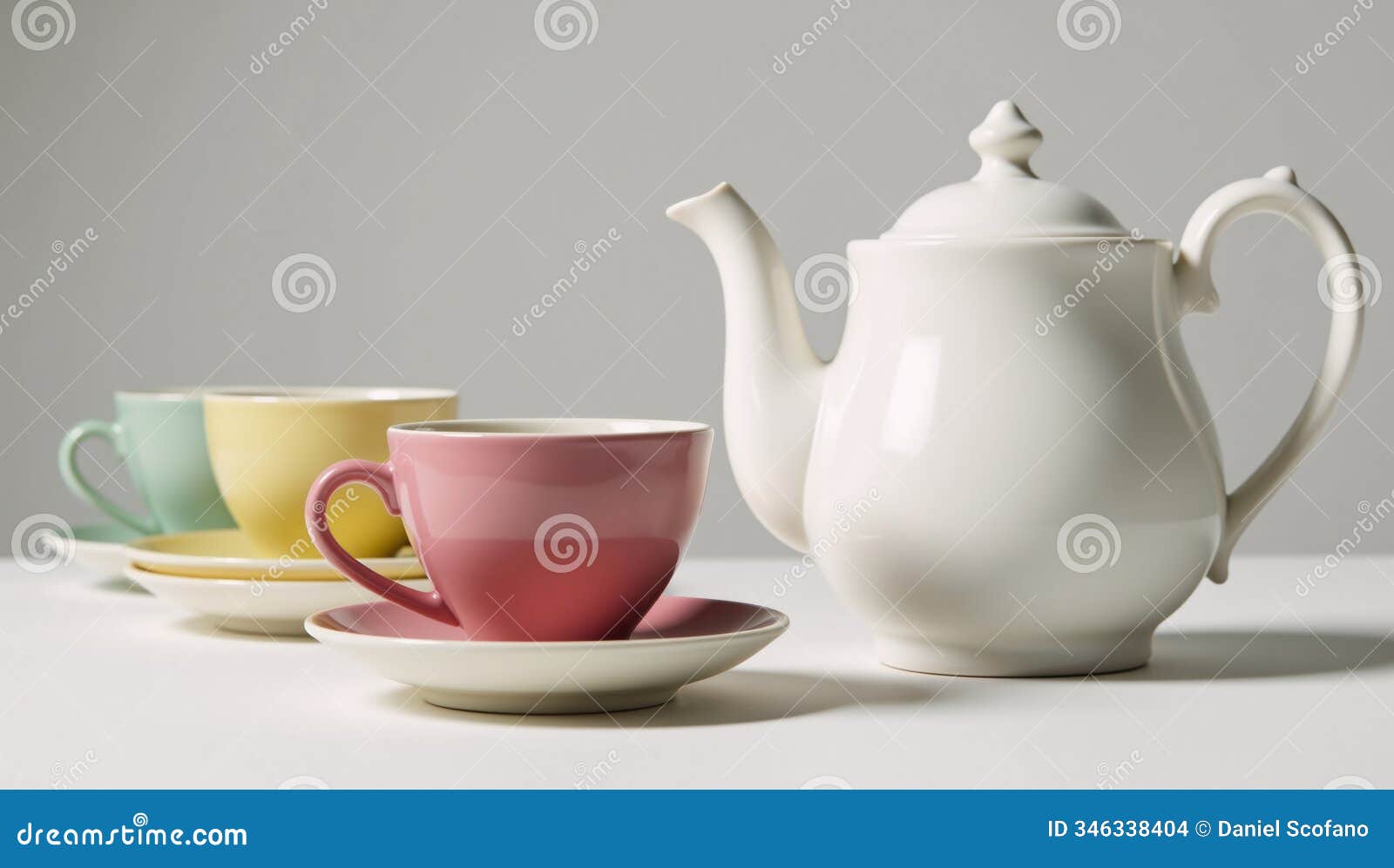 teapot on white backdrop with refreshments table setting
