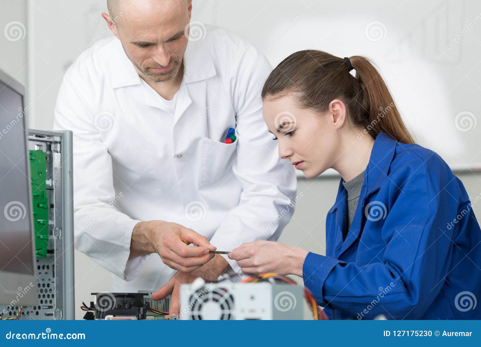 Tech Tests Electronic Equipment in Service Centre Stock Photo Image