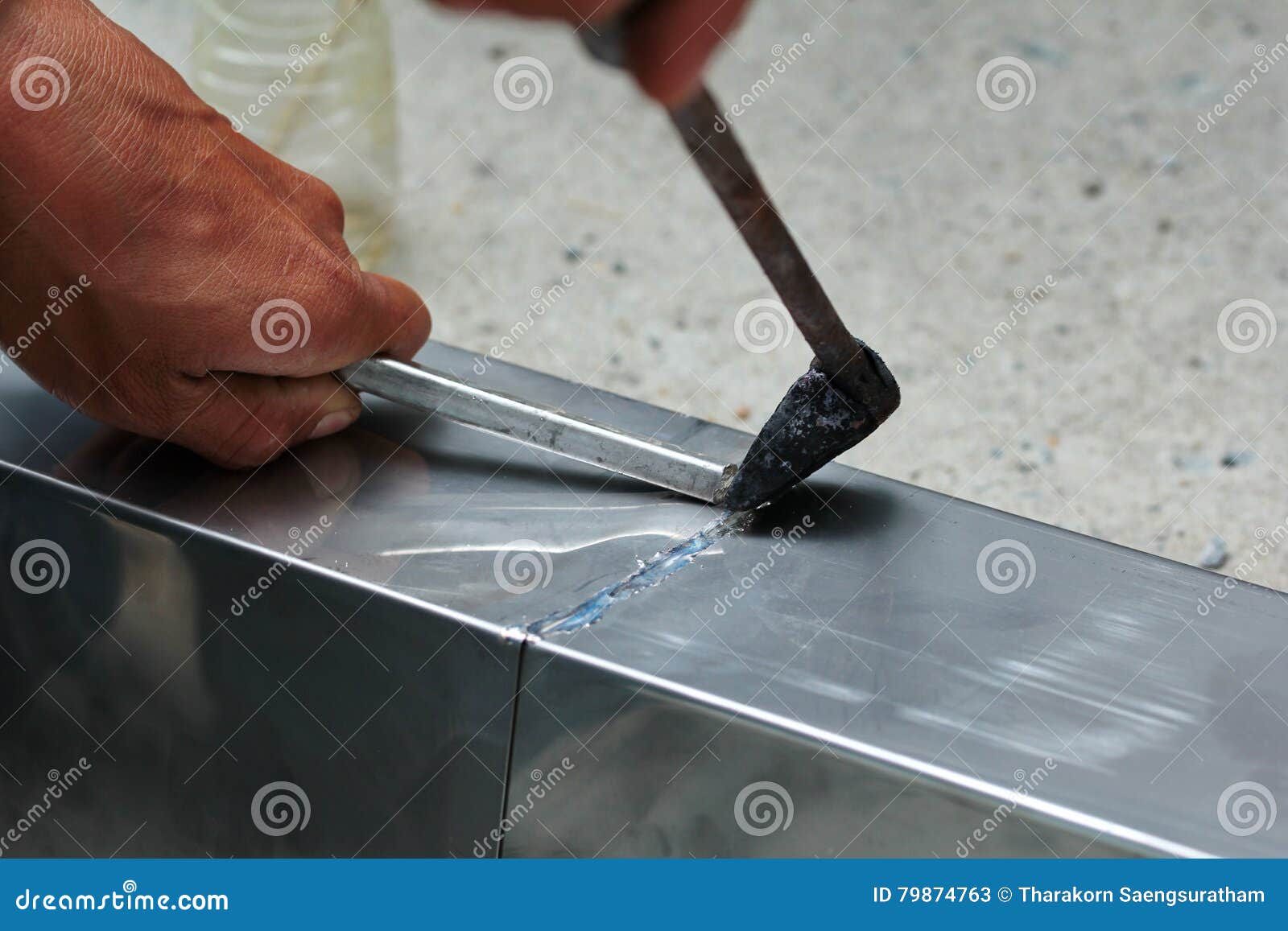 Techician is Welding Aluminium Pipe by Using Soldering Copper. Stock