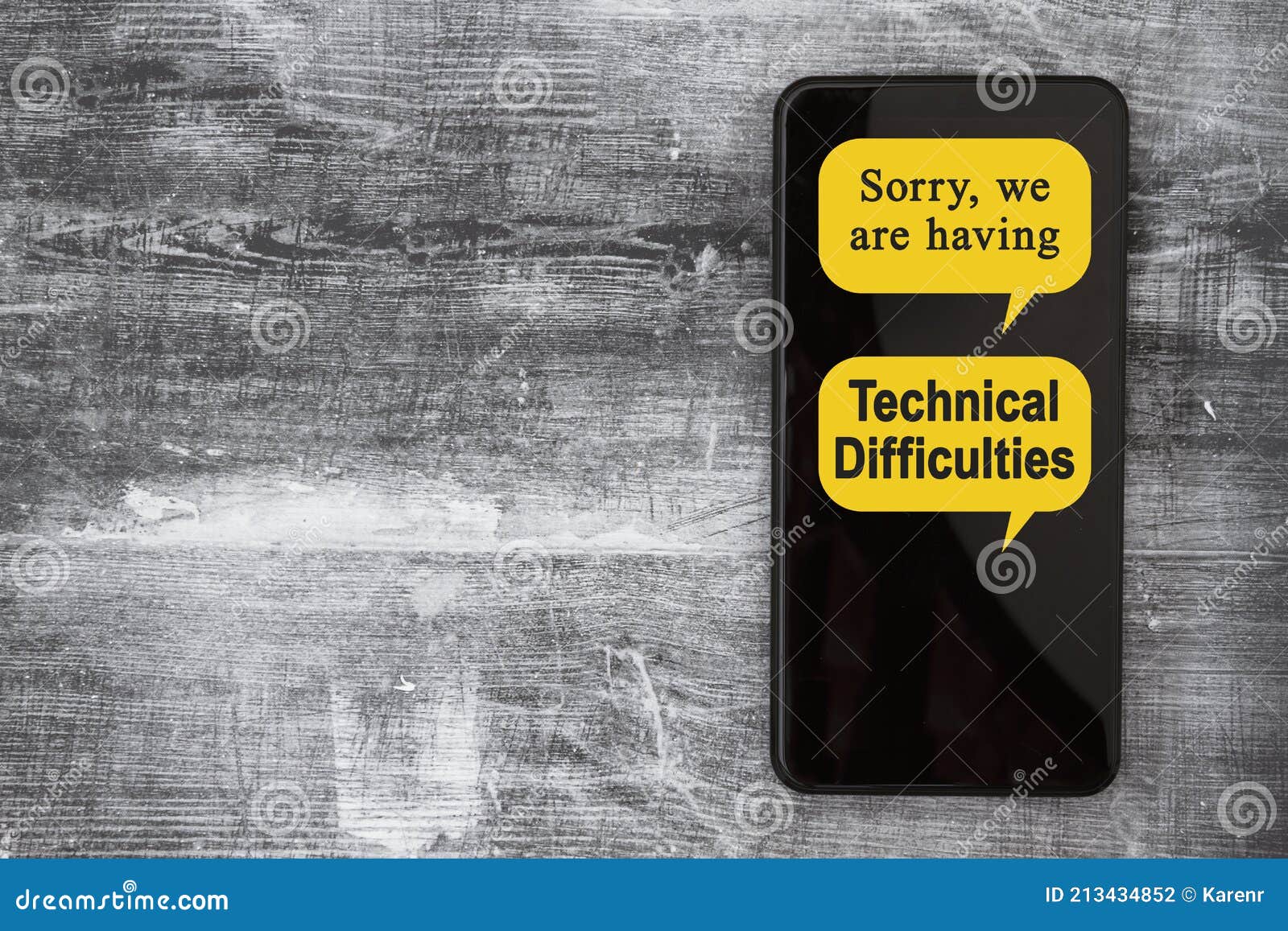 technical-difficulties-message-on-a-black-mobile-phone-stock-photo