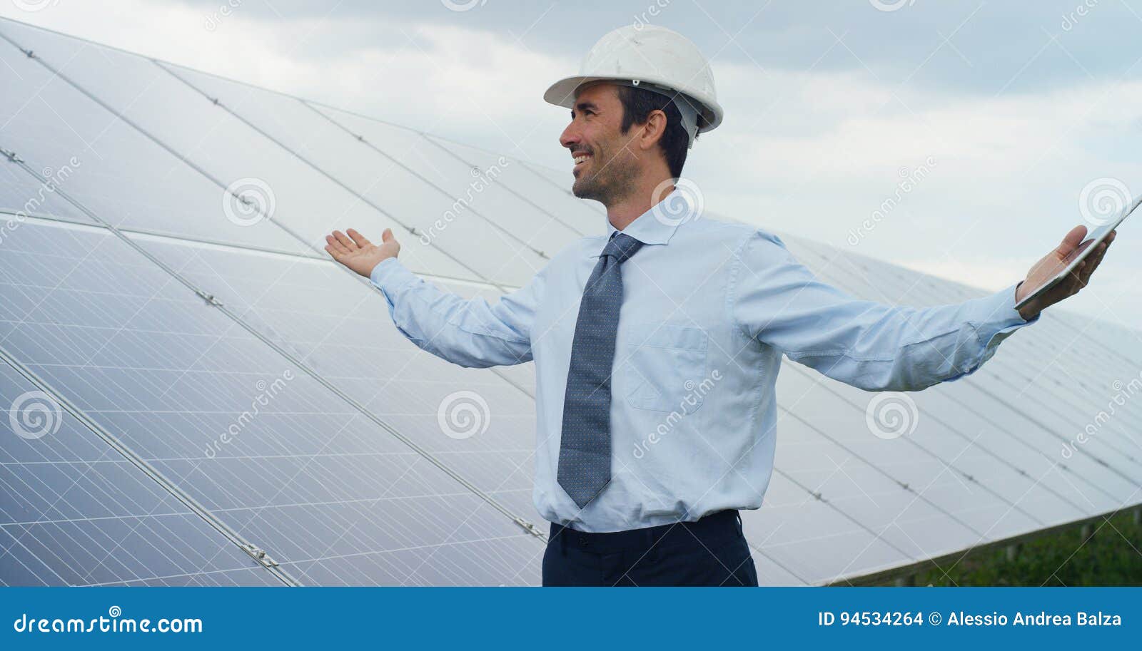 technical expert in solar energy photovoltaic panels, remote control performs routine actions for system monitoring using clean, r