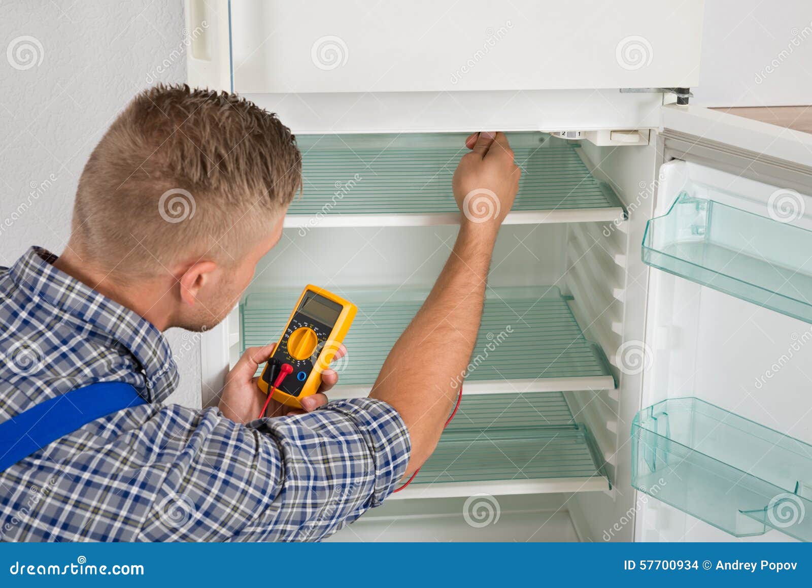 Technician Checking Fridge with Multimeter Stock Photo Image of