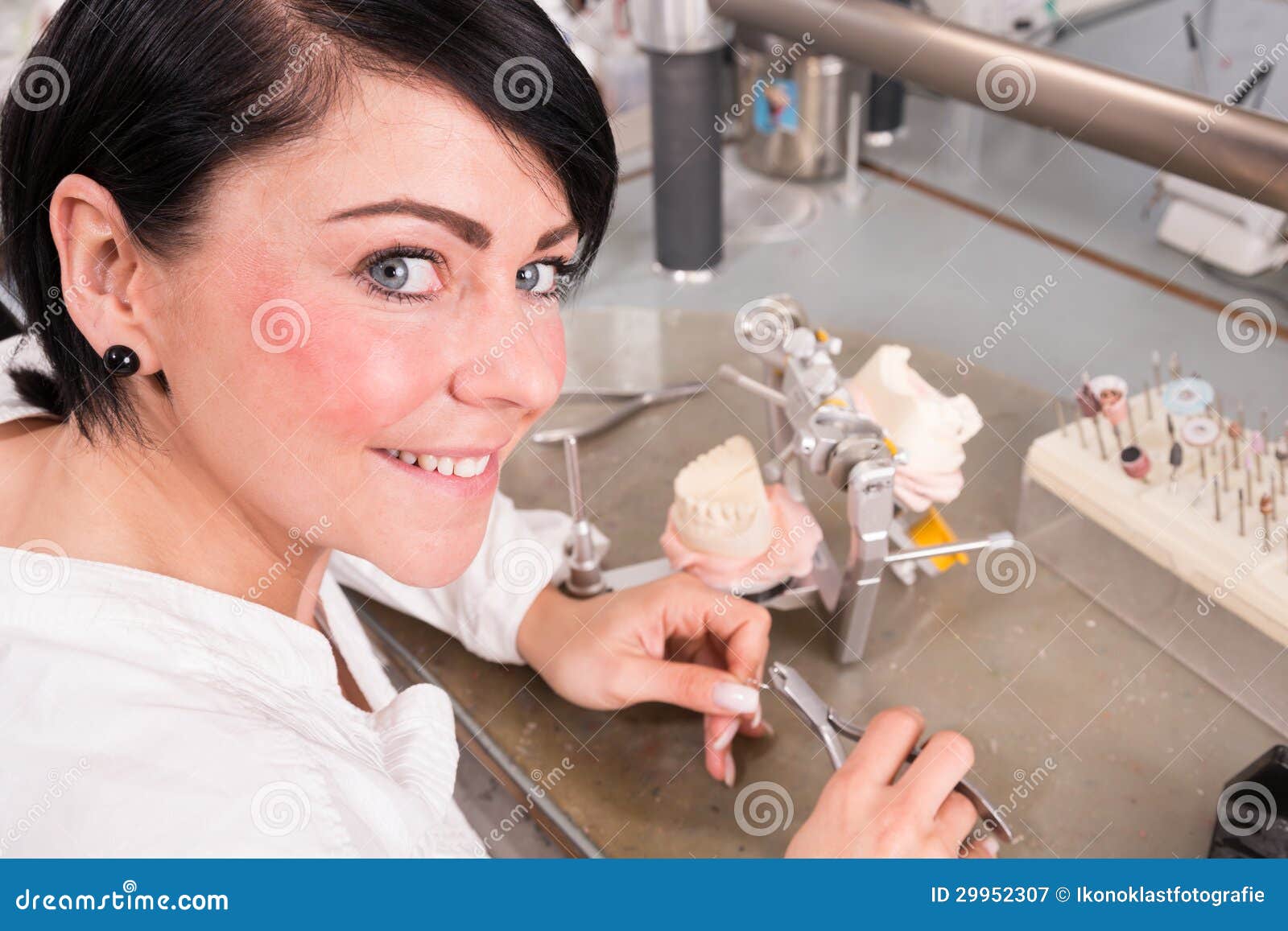 Technician Producing a Dental Prosthesis in a Laboratory or