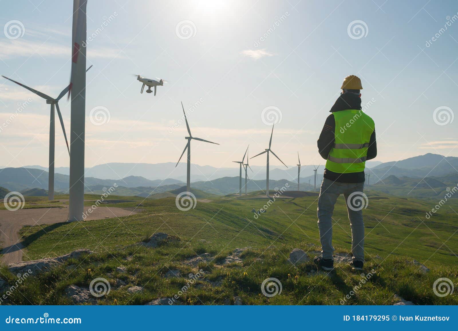 Technician Engineer in Wind Turbine Power Generator Station Launches a