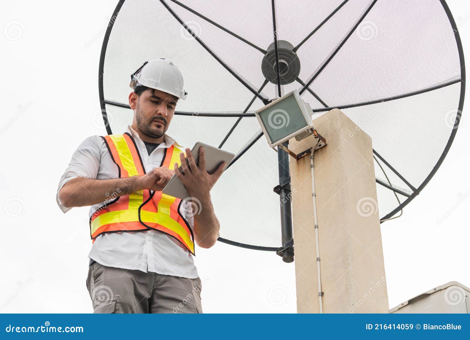 Technician or Engineer Working with Satellite Dish Stock Image Image