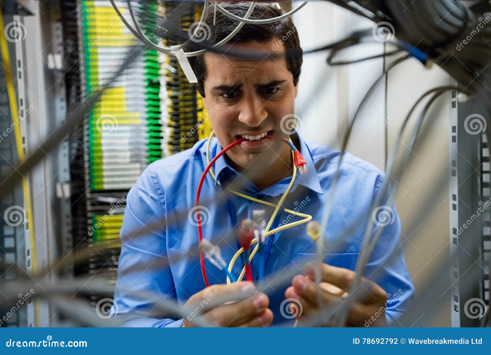 Technician fixing cable stock photo. Image of computer 78692792