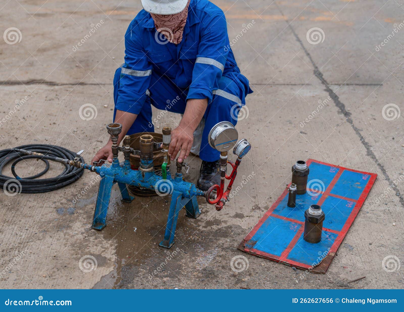 Technician Function Test the Process Oil and Gas Safety Valve at Gas
