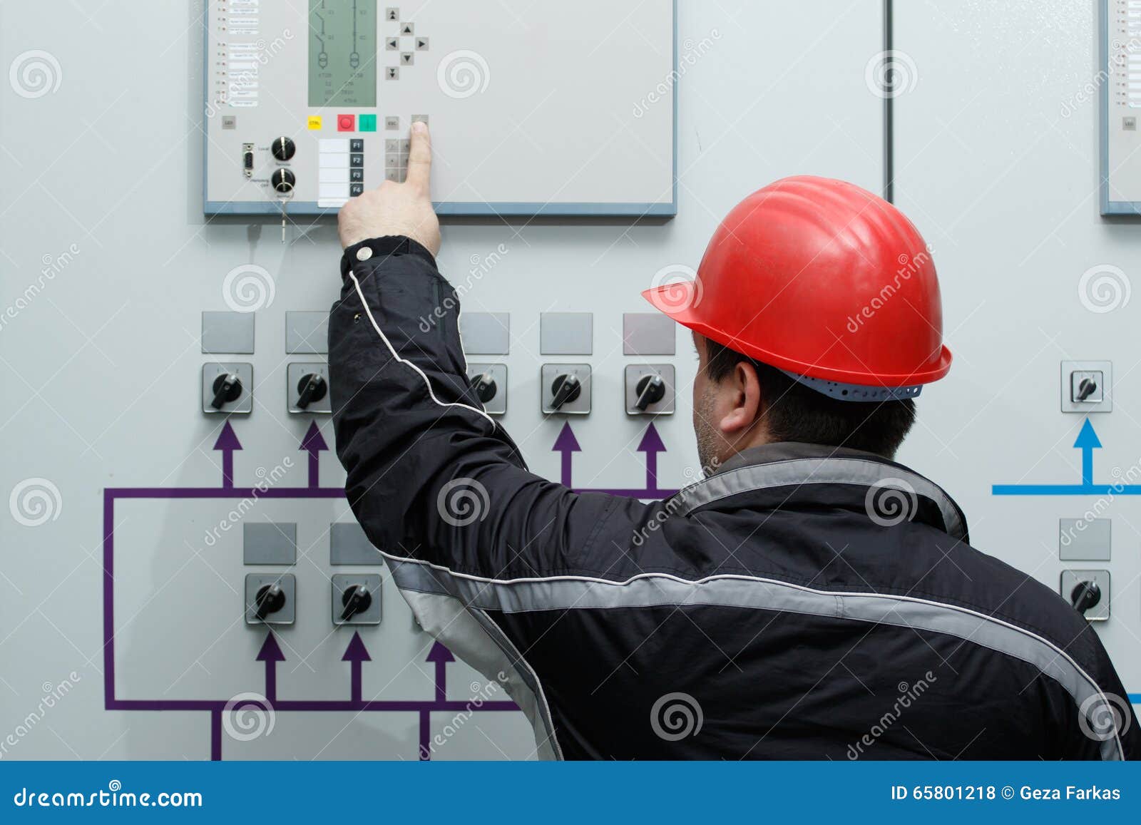 Technician Give Command in Power Plant Control Center Stock Photo