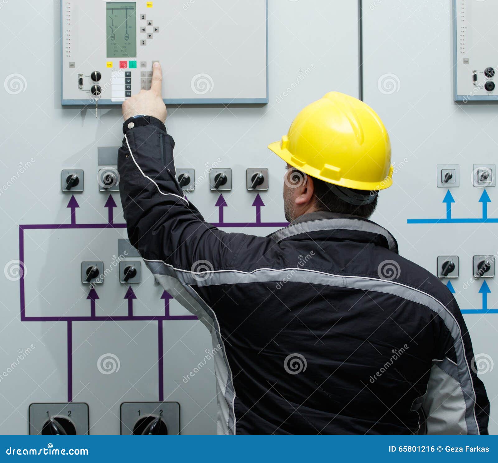 Technician Give Command in Power Plant Control Center Stock Photo